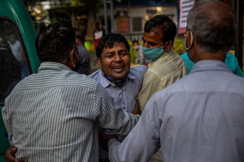 Siddiqui captures the pain of a man outside the coronavirus ward at the Guru Teg Bahadur hospital, New Delhi, on April 23, 2021. Reuters