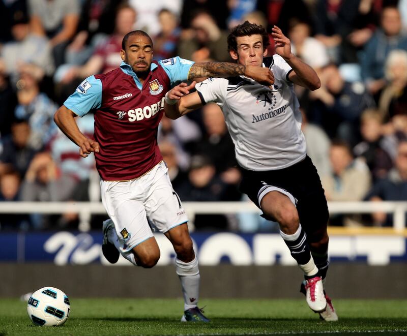 Gareth Bale of Spurs and West Ham's Kieron Dyer compete for the ball during the Premier League match at Upton Park in September 2010. Getty