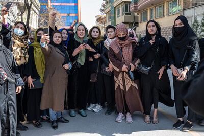 Afghan women stage a protest for their rights to mark International Women's Day, in Kabul on March 8, 2023. AFP