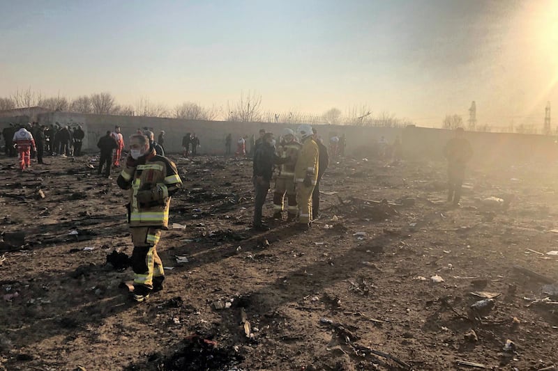 Debris is seen from a plane crash on the outskirts of Tehran, Iran, Wednesday, Jan. 8, 2019. A Ukrainian airplane carrying at least 170 people crashed on Wednesday shortly after takeoff from Tehran‚Äôs main airport, killing all onboard, state TV reported. (AP Photos/Mohammad Nasiri)