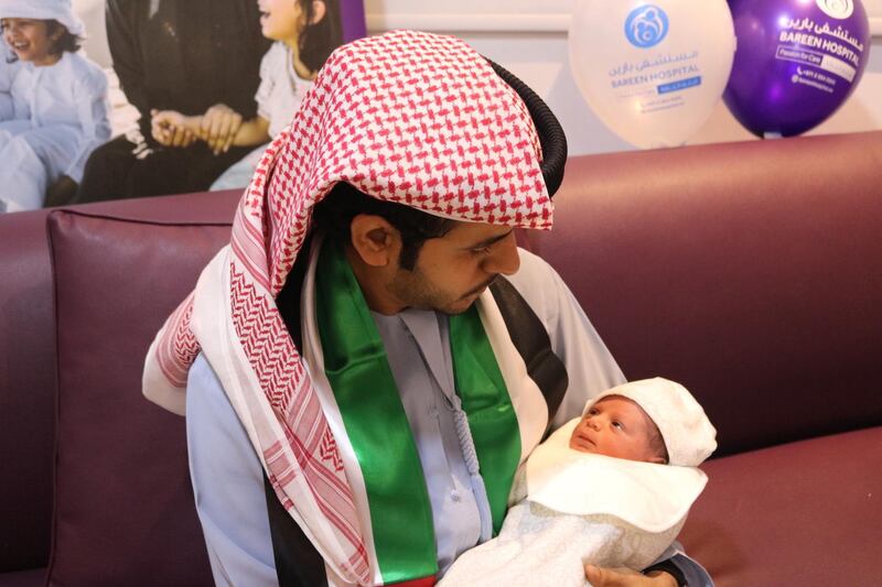 Mohammad Hamad Al Marri, 26, with baby Hamed at Bareen Hospital on the 48th National Day. Courtesy: Bareen