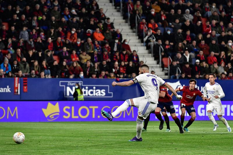 Karim Benzema takes a penalty kick which was saved by Osasuna goalkeeper Sergio Herrera. AP