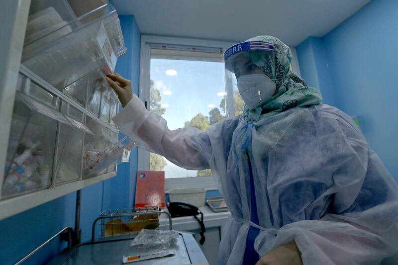 A member of medical staff works in the Covid wards of the el Hadi Flici hospital in Algiers. AP