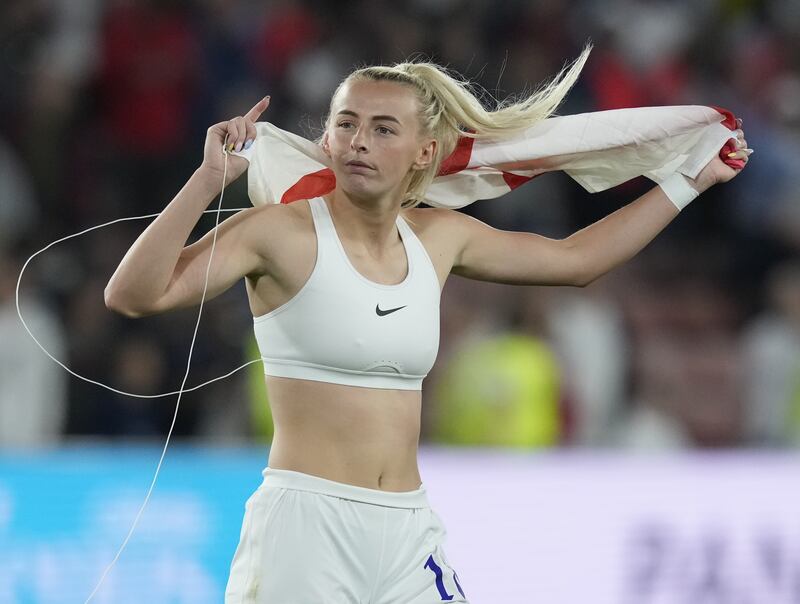 England's Chloe Kelly celebrates after the win. EPA
