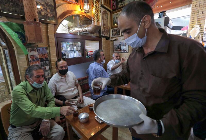 Iraqis gather at a coffee shop in Erbil, the capital of the autonomous Kurdish region of northern Iraq.  AFP