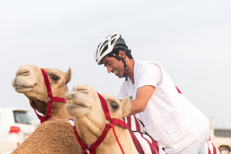 DUBAI, UNITED ARAB EMIRATES - DEC 3,

Camels and their riders get ready by the track at Dubai International Endurance City.

The third edition of the National Day Camel Marathon, organised by the Hamdan Bin Mohammed Heritage Centre, HHC, in co-operation with the Dubai Camel Racing Club, celebrates UAE’s 46th National Day, at Dubai International Endurance City, Saih Al Salam.

(Photo by Reem Mohammed/The National)

Reporter:  ANNA ZACHARIAS
Section: NA