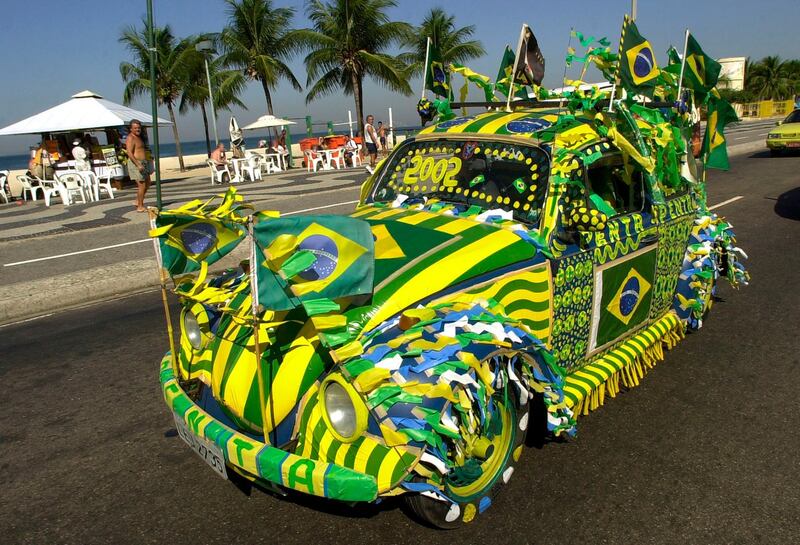 A Beetle, known as Fusca in Brazil, painted in Brazilian colours at Copacabana Beach in Rio de Janeiro. AP Photo