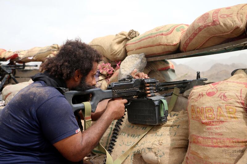 epa06912153 A member of Yemeni government forces fires a heavy machine gun during an offensive against Houthi positions on the outskirts of the western port city of Hodeidah, Yemen, 26 July 2018. According to reports, Yemen has been engulfed in a violent conflict between the Saudi-backed government and Houthi rebels since 2015, while UN Special Envoy to Yemen Martin Griffiths tires to push for a deal with Houthi militia leaders to cede control of the Red Sea port of Hodeidah to a UN-supervised committee, in an attempt to end the Saudi-led coalition assault on Hodeidah city.  EPA/NAJEEB ALMAHBOOBI
