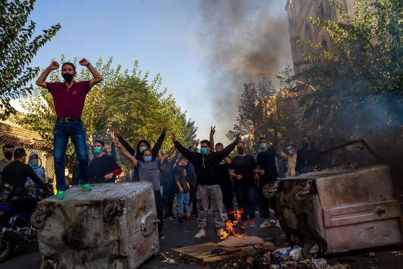 Iranians protest against the death of Mahsa Amini, 22, in Tehran last October. AP