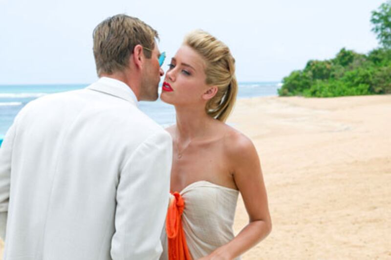 Aaron Eckhart and Amber Heard star in 'The Rum Diary', an adaptation of the book by Hunter S Thompson.