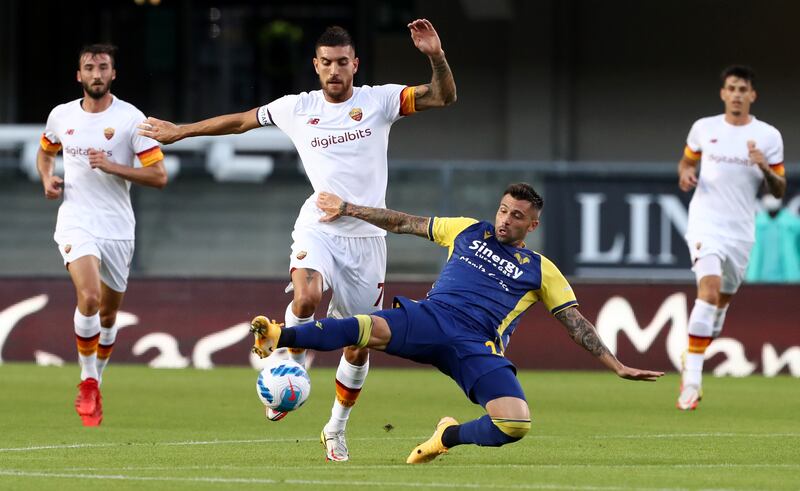 Verona's Daniel Bessa tackles Lorenzo Pellegrini of Roma. Getty