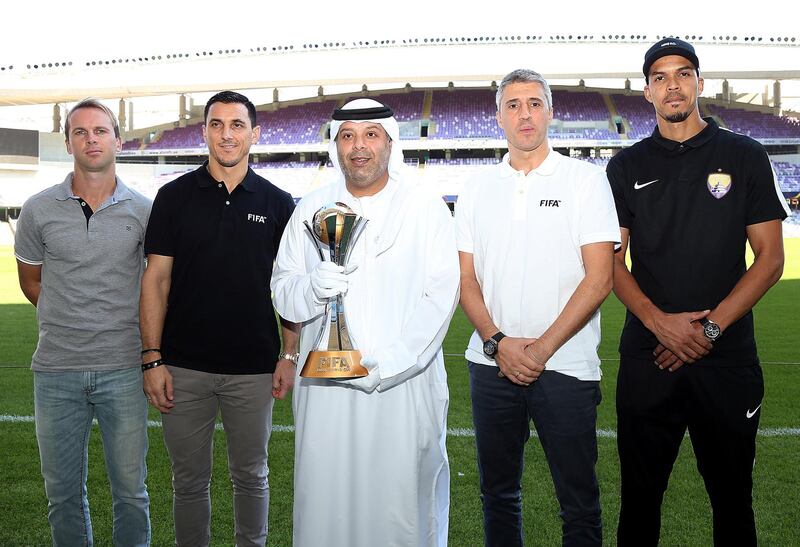 Al Ain, November, 28, 2018: ( L to R ) Craig Henderson, Nicolas Burdissa, Ahmed Al Qubaisi,Hernan Crespo and Ismail Ahmed pose with the trophy at the Hazza Bin Zayed stadium ahead of Fifa Club World Cup in Al Ain. Satish Kumar for the National/ Story by Amit Pasella