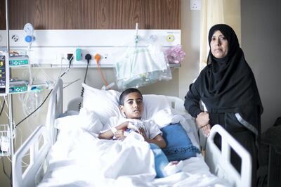 DUBAI, UNITED ARAB EMIRATES - April 14 2019.

Muayad Al Arjani, a 12 year old Palestinian boy, at King’s College Hospital, with his mom Mona.

Muayad has brittle bone disease whose legs break and deform at the slightest knock has been flown to Dubai for a treatment.

His treatment and stay here has been provided for by the Little Wings Foundation, a UK-registered charity, that works here in partnership with the Al Jalila Foundation and in Palestine with the Palestinian Children’s Relief Fund.

(Photo by Reem Mohammed/The National)

Reporter: Nick Webster
Section: NA