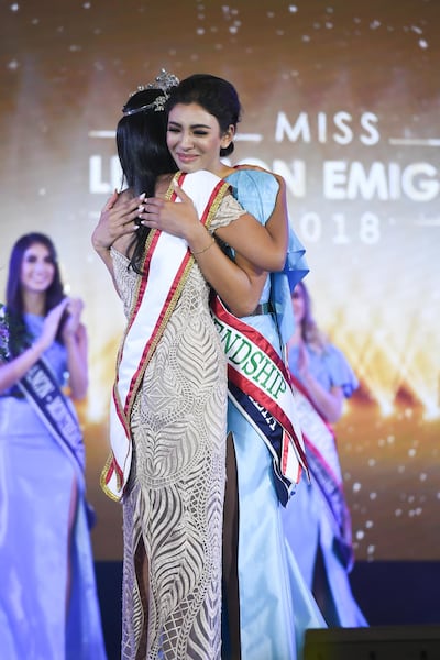 Australia’s Rachel Younan hugs the former Miss Lebanon Emigrant as she is announced this year's winner. The 23-year-old triumphed over 10 other finalists from around the world, all of whom have Lebanese heritage, at a ceremony held in Pattaya, Thailand.