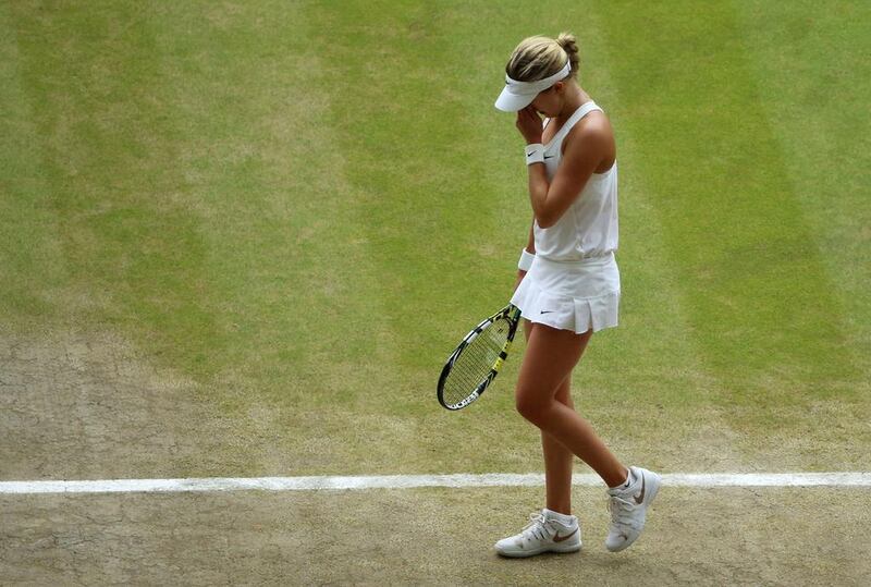 Eugenie Bouchard reacts to missing a point to against Petra Kvitova on Saturday during the 2014 Wimbledon women's singles final. Gareth Fuller / AFP