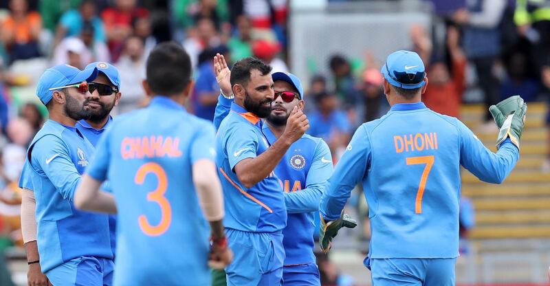 India's Mohammed Shami celebrates after the dismissal of Bangladesh's Tamim Iqbal during the Cricket World Cup match between India and Bangladesh at Edgbaston in Birmingham, England, Tuesday, July 2, 2019. (AP Photo/Rui Vieira)