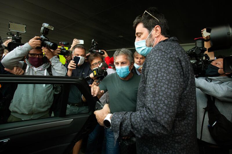 Lionel Messi's father and representative Jorge Messi (C) arrives at El Prat Airport in Barcelona. EPA