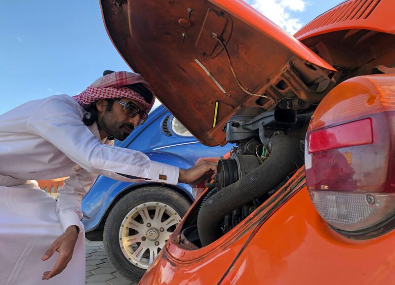 German car maker Volkswagen's Beetle has enjoyed a big following since the first one rolled off the production lines in 1938. The Egypt Beetle Club, founded in Cairo seven years ago, brought together more than 22,000 fans of the model at rallies and online. Here Maghiouf El Tamimi, a Saudi Arabian enthusiast, checks his car before a tour of the Egyptian capital. Reuters