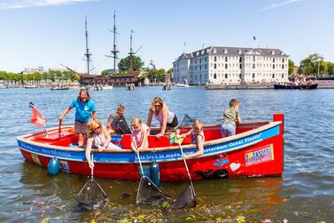 Plastic Whale has 40 skippers and a fleet of 10 boats to scoop plastic waste from Amsterdam’s 165 canals. Courtesy Plastic Whale