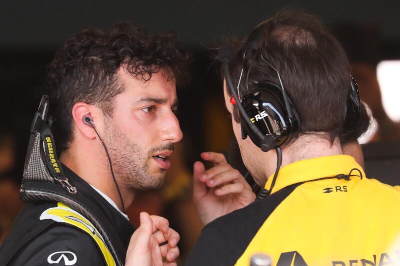 epa07444310 Australian Formula One driver Daniel Ricciardo of Renault talks to a team member after he retired from the 2019 Formula One Grand Prix of Australia at the Albert Park Grand Prix Circuit in Melbourne, Australia, 17 March 2019.  EPA/ASANKA BRENDON RATNAYAKE / POOL