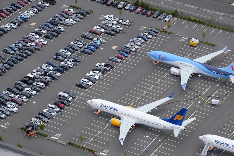 SEATTLE, WA - JUNE 27: Boeing 737 MAX airplanes are stored on employee parking lots near Boeing Field, on June 27, 2019 in Seattle, Washington. After a pair of crashes, the 737 MAX has been grounded by the FAA and other aviation agencies since March, 13, 2019. The FAA has reportedly found a new potential flaw in the Boeing 737 Max software update that was designed to improve safety.   Stephen Brashear/Getty Images/AFP