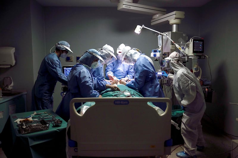 A tracheotomy operation on an intensive care covid patient. Milan (Italy), April 21st  2020 (Photo by Daniele Frediani/Archivio Daniele Frediani/Mondadori Portfolio via Getty Images)