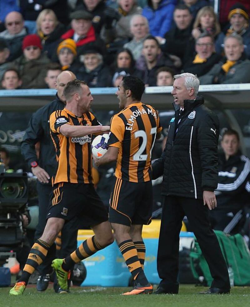 Hull City's David Meyler, left, reacts after Newcastle United's manager Alan Pardew, right, delivered a headbutt to him during their English Premier League match at the KC Stadium, Hull, England on March 1, 2014. Newcastle manager Alan Pardew is facing a potentially lengthy touchline ban after the incident that overshadowed Newcastle’s 4-1 victory. Lynne Cameron / AP Photo