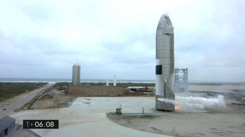 In this image from video made available by SpaceX, a starship test vehicle sits on the ground after returning from a flight test in Boca Chica, Texas. AP Photo