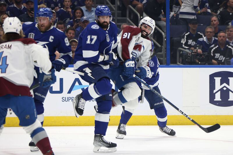 Alex Killorn of the Tampa Bay Lightning and Kadri collide in the first period of the game. AFP
