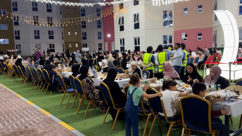 Palestinians share iftar during Ramadan at Emirates Humanitarian City in Abu Dhabi. Wajod Alkhamis / The National