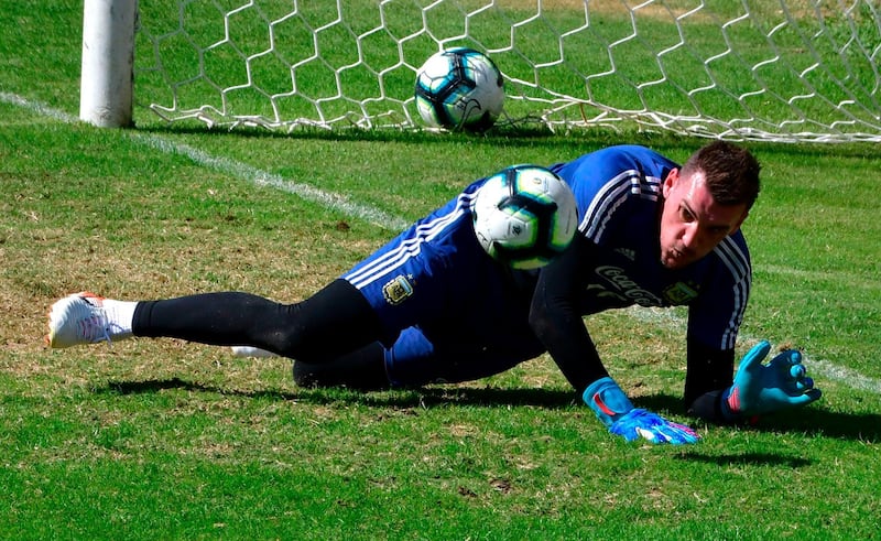 Argentina goalkeeper Franco Armani stops a ball during a training session in Belo Horizonte. AFP