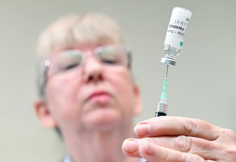 A nurse draws from a vial of vaccine at the Camp Hill Medical Centre in Brisbane, Australia. More than six million Australians are now eligible to receive coronavirus vaccines under a new phase of the national programme. EPA
