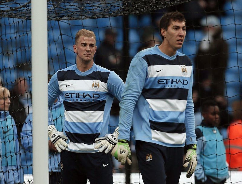 Joe Hart, left, was dropped in favour of Costel Pantilimon, right, on Saturday. Phil Noble / Reuters