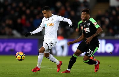 SWANSEA, WALES - NOVEMBER 25: Jordon Ibe of AFC Bournemouth puts pressure on Martin Olsson of Swansea City during the Premier League match between Swansea City and AFC Bournemouth at Liberty Stadium on November 25, 2017 in Swansea, Wales.  (Photo by Catherine Ivill/Getty Images)