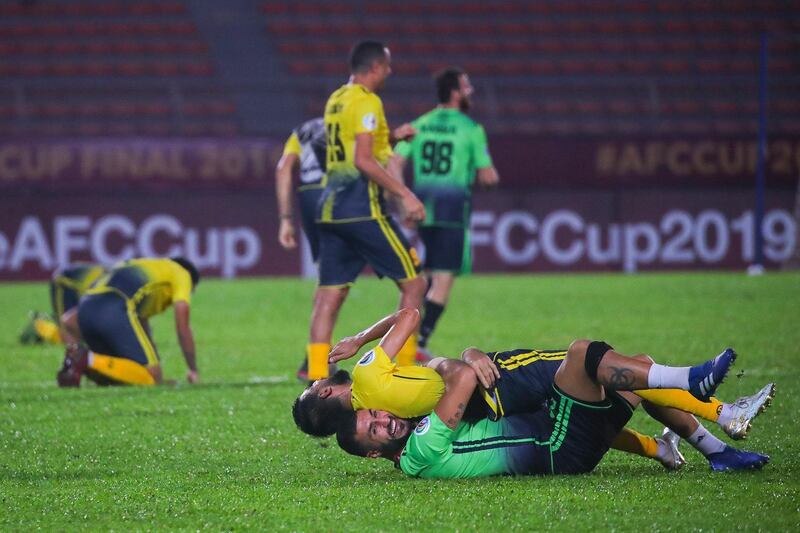 Al Ahed  players celebrate at the final whistle after winning AFC Cup Final against April 25 Sports Club of North Korea in Kuala Lumpur.  EPA