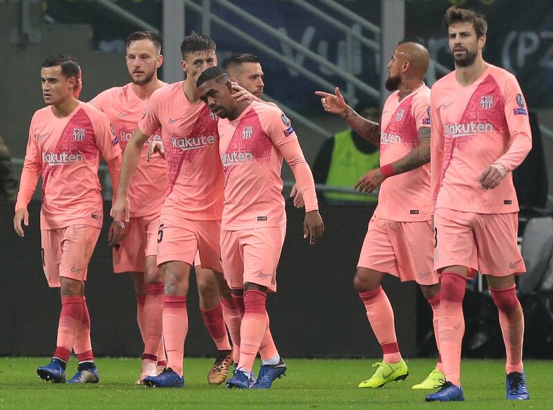 MILAN, ITALY - NOVEMBER 06:  Malcom (C) of FC Barcelona celebrates with his team-mates after scoring the opening goal during the Group B match of the UEFA Champions League between FC Internazionale and FC Barcelona at San Siro Stadium on November 6, 2018 in Milan, Italy.  (Photo by Emilio Andreoli/Getty Images)