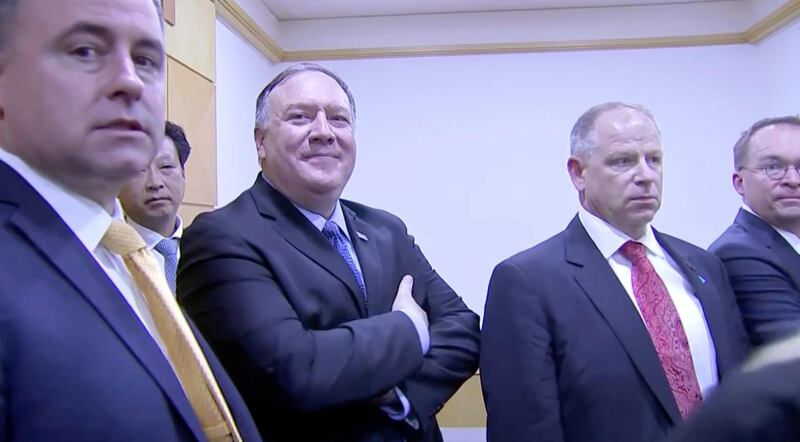 US Secretary of State Mike Pompeo listens on as President Donald Trump speaks with North Korean leader Kim Jong-un. Reuters