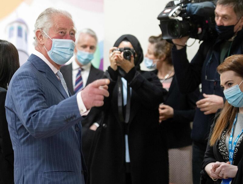Prince Charles tours the vaccination centre at Finsbury Park Mosque. AFP