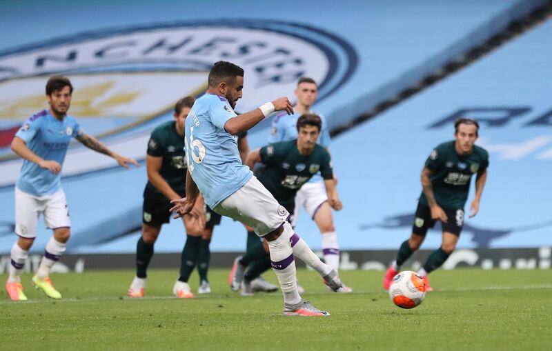 Riyad Mahrez of Manchester City scores from the penalty spot to make it 3-0. EPA
