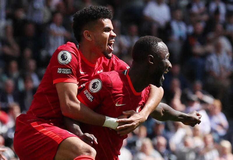 Liverpool's Naby Keita celebrates with Luis Diaz after scoring the only goal in the Premier League win against Newcastle at St James' Park. Reuters