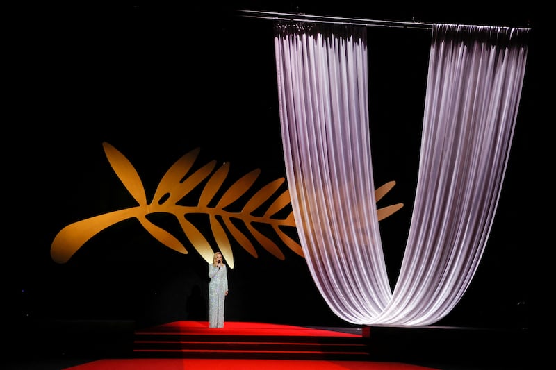 Master of ceremony Virginie Efira speaks on stage during the opening event at Cannes. Reuters