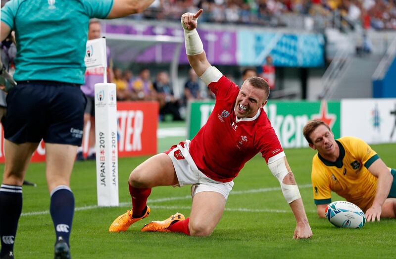 Hadleigh Parkes celebrates scoring Wales' first try against Australia. Reuters