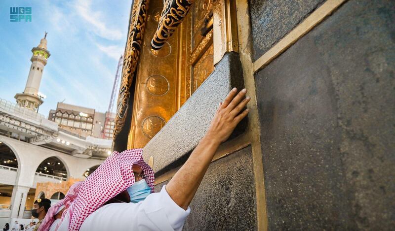 An official from the General Presidency for the Affairs of the Two Holy Mosques takes part in the cleaning operation at the Kaaba in the Grand Mosque, in Makkah, Saudi Arabia. Reuters