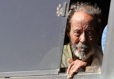 A Sudanese man looks out of a bus window as he arrives at Karkar bus terminal near Aswan, southern Egypt. EPA