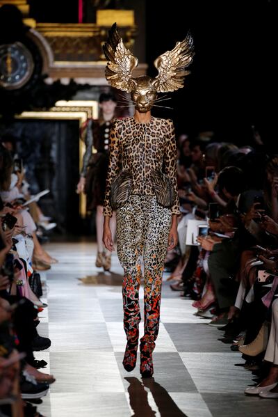 A model presents a creation by designer Bertrand Guyon as part of his Haute Couture Fall-Winter 2018/2019 fashion show for fashion house Schiaparelli in Paris, France, July 2, 2018.   REUTERS/Regis Duvignau