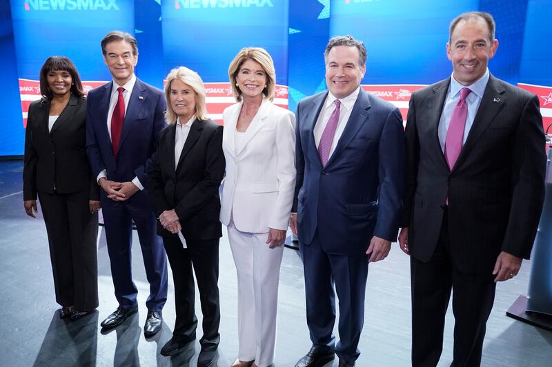 Kathy Barnette, Mehmet Oz, moderator Greta Van Susteren, Carla Sands, David McCormick, and Jeff Bartos, (left to right) pose for photo before they take part in a debate for Pennsylvania US  Senate Republican candidates on May 4. AP
