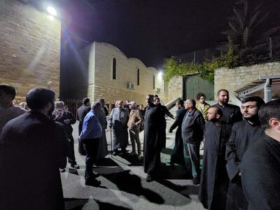 Jerusalem's Armenian laity mingle with clergy in the contested car park. Photo: Hagop Djernazian 