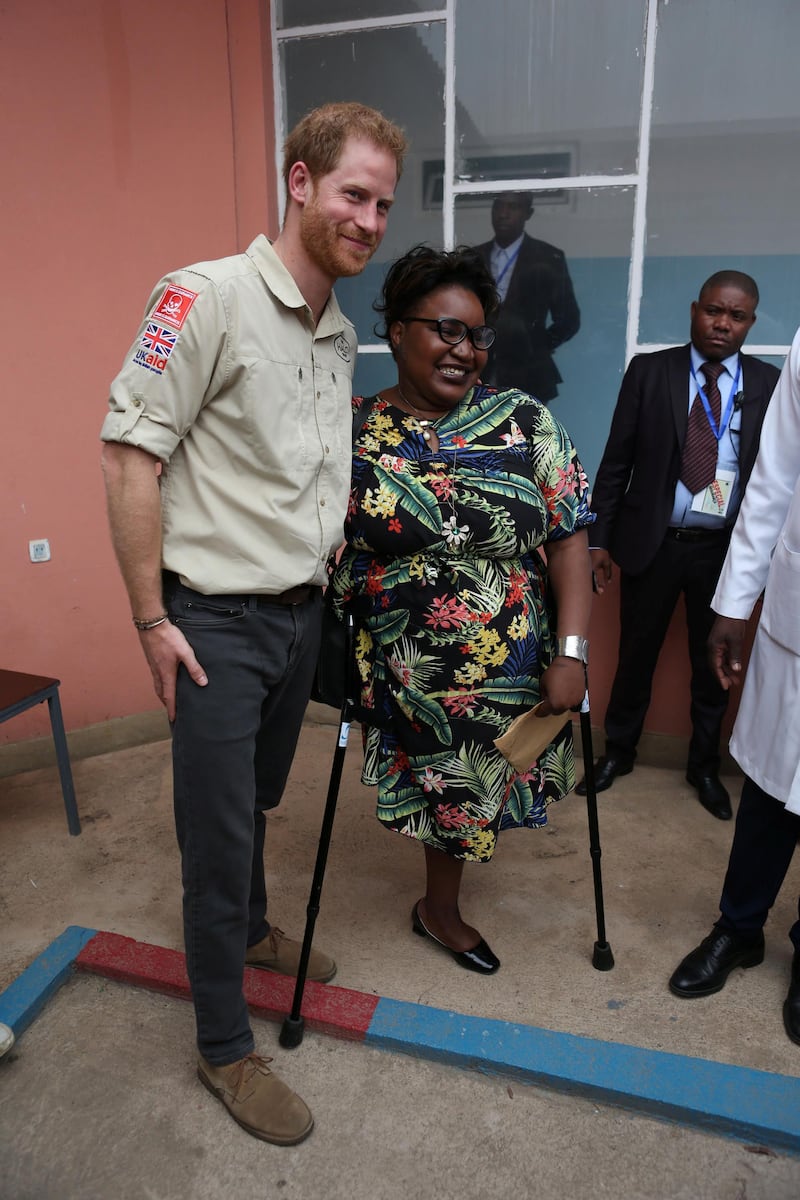 Prince Harry meets a patient during a visit to the Princess Diana Orthopaedic Centre. Reuters