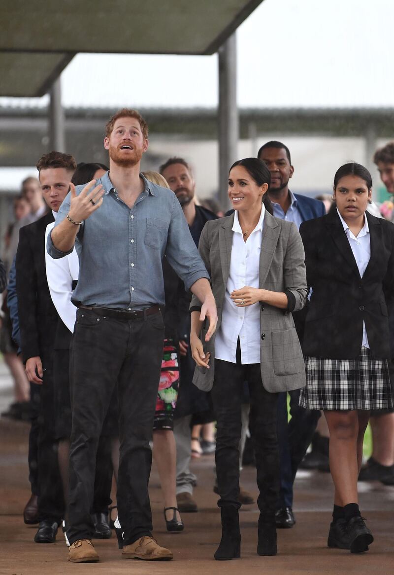 Meghan, Duchess of Sussex, wears a Serena Williams blazer, Maison Kitsune shirt and Outland Denim jeans during a visit to the Dubbo College Senior Campus in Australia on October 17, 2018. AFP