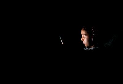 A child in darkness during a power cut in Cairo. Reuters